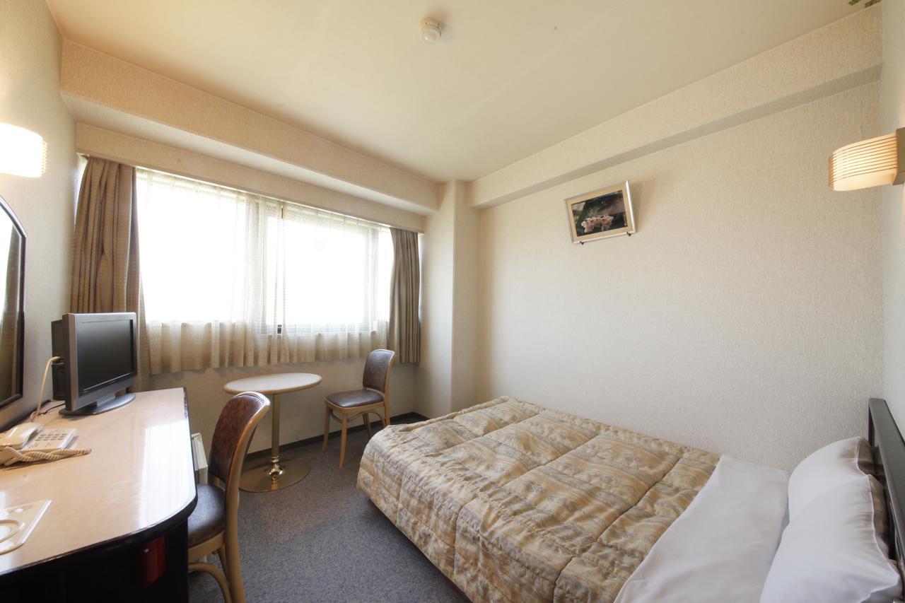 โฮเต็ล ทาเฮอิ Hotel มัตสึยามะ ภายนอก รูปภาพ